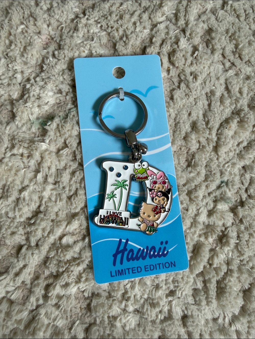 Limited Edition Hello Kitty Hawaii 'D’ Keychain Charm in White and Multicolor
